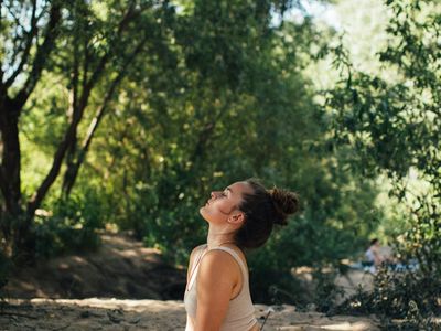 A person performing a deep stretching yoga pose.